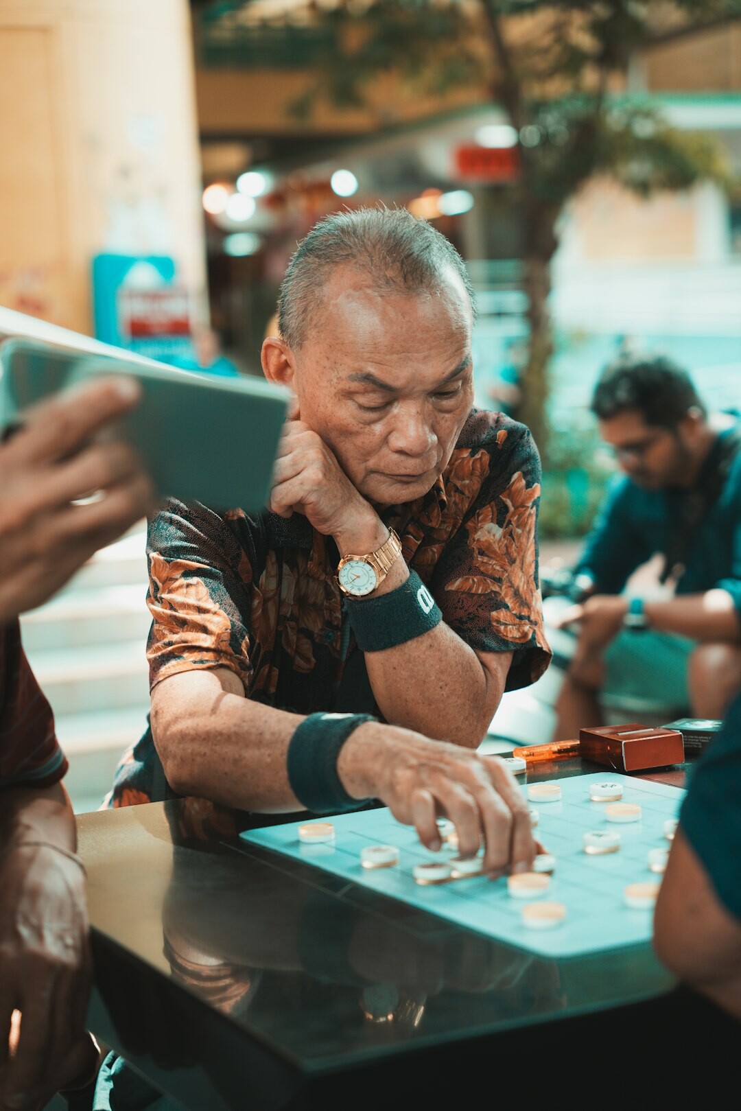 group of seniors playing cards