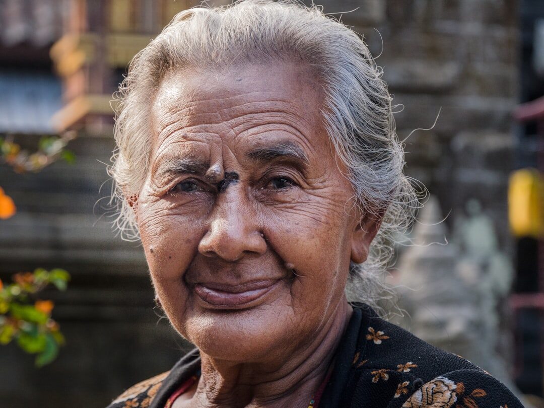 Portrait of a smiling elderly woman with gray hair
