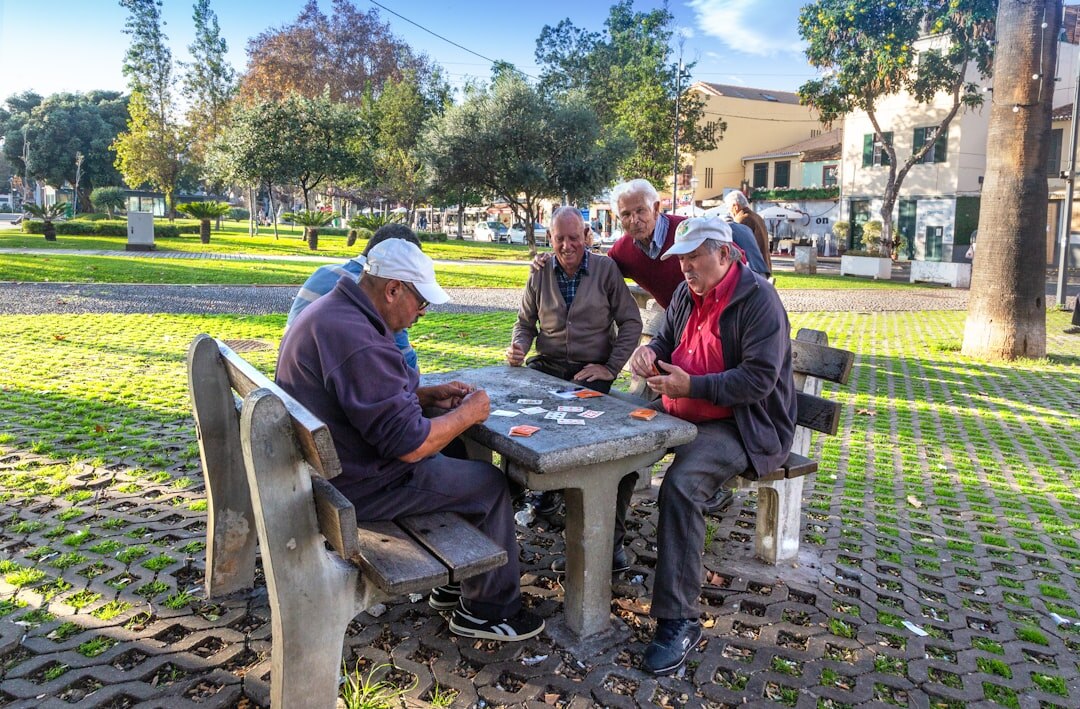 seniors walking in neighborhood park