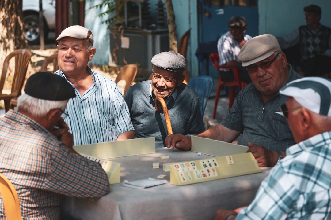 group of seniors playing board games
